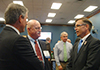 AWPA member company representatives talk to Rep. Schilling before the event.