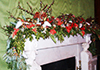 In the Green Room, decorations focus on the winter garden. Miniature terrariums dangle from the trees and mantelpiece